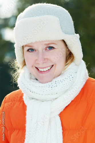 Woman at winter outdoors photo