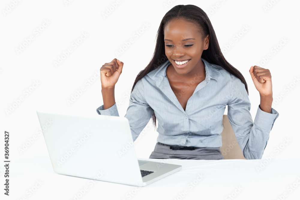 Cheerful businesswoman working with a notebook Cheerful businesswoman working with a notebook