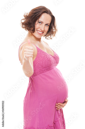 pregnant woman showing thumbs up