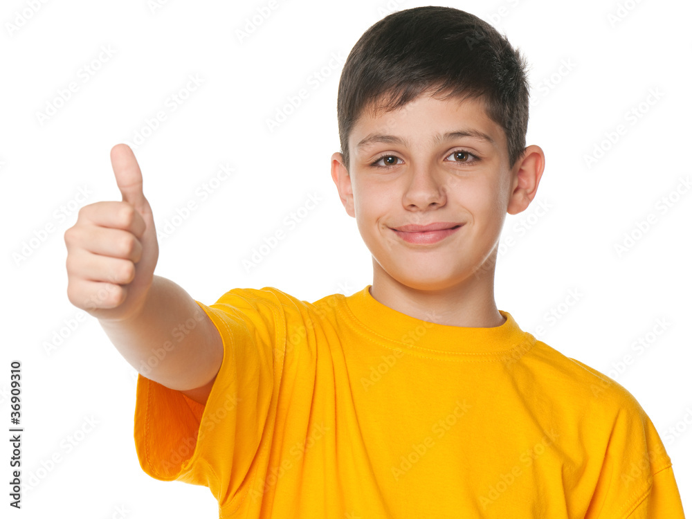 Smiling teenager demonstrates thumb up Smiling teenager demonstrates thumb up
