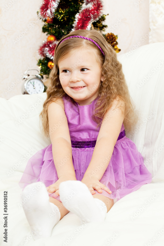 little girl at a Christmas fir-tree. little girl at a Christmas fir-tree.