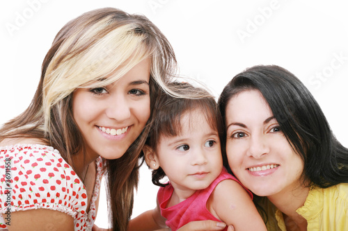Happy portrait of beautiful young mother with two daughter looki