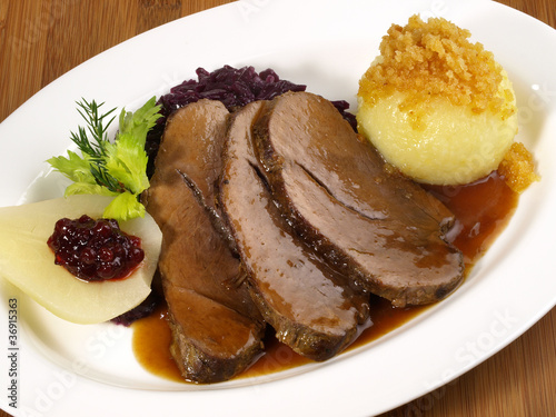 Wildschweinbraten - Schweinebraten mit Knödel photo
