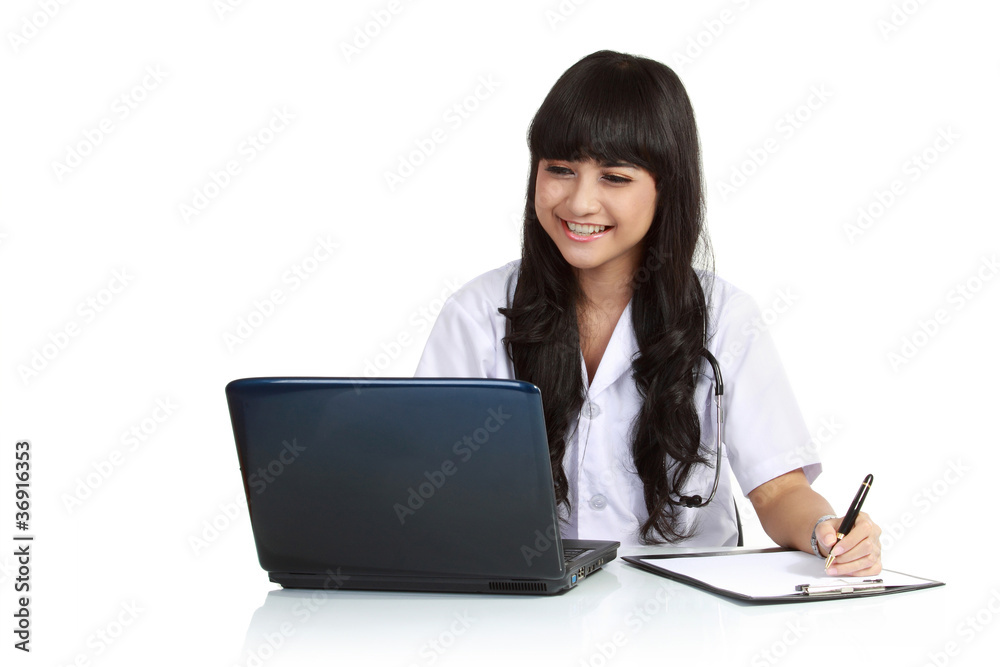 female doctor working on her desk female doctor working on her desk