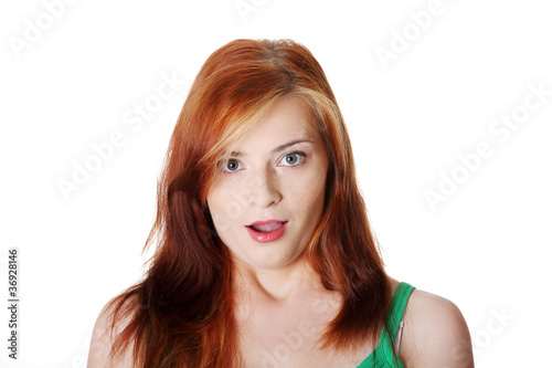 Closeup on surprised teen girl`s face