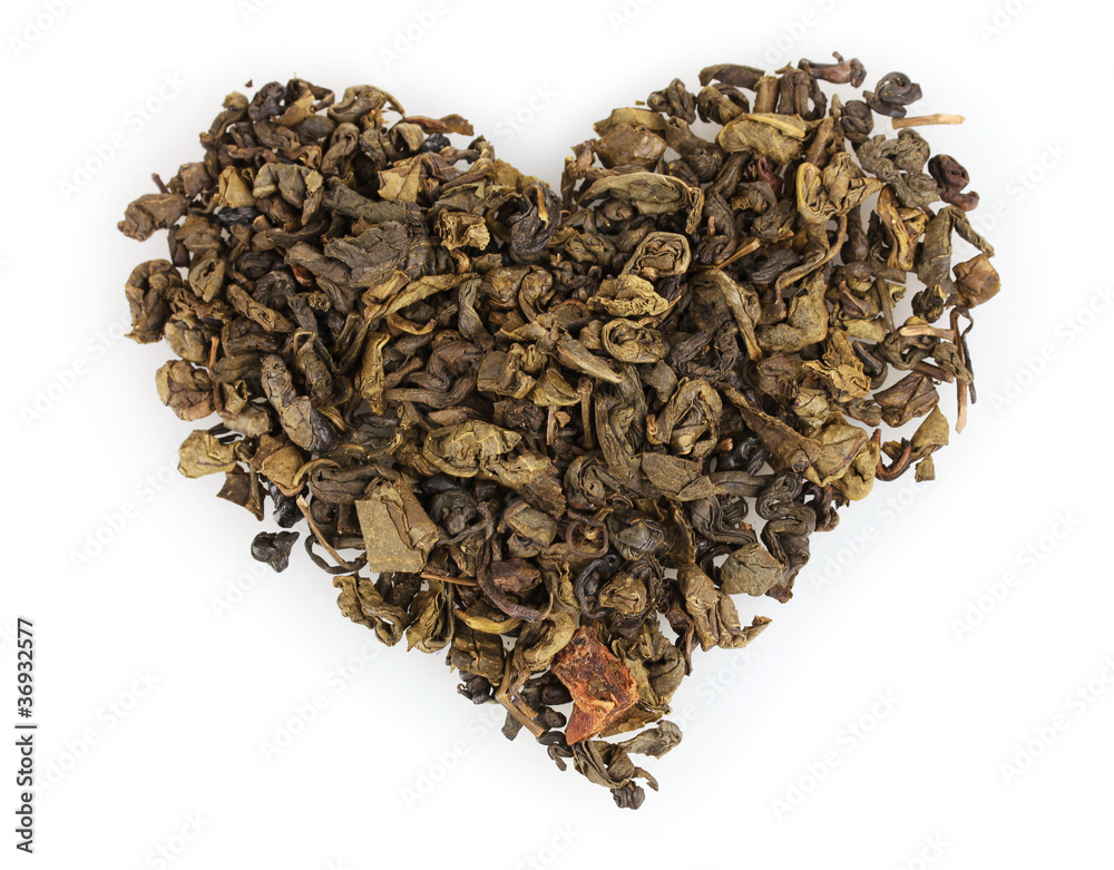 green dry tea heart shape isolated on white green dry tea heart shape isolated on white
