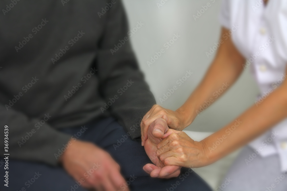 Therapist comforting patient - soft blur
