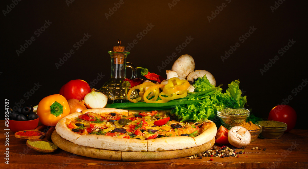 delicious pizza, vegetables and spices