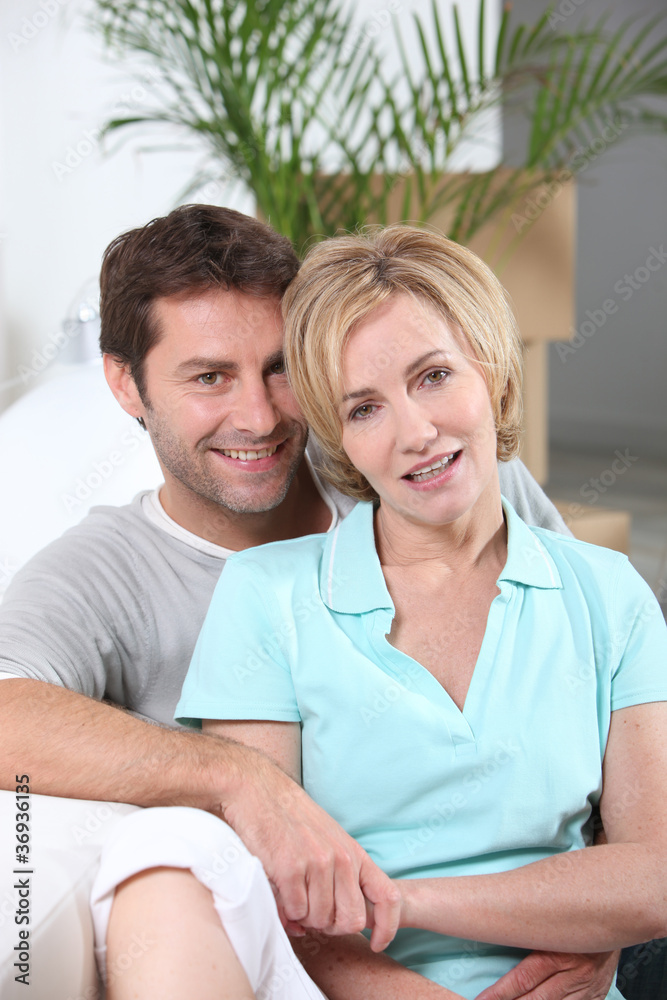portrait of a couple with boxes portrait of a couple with boxes