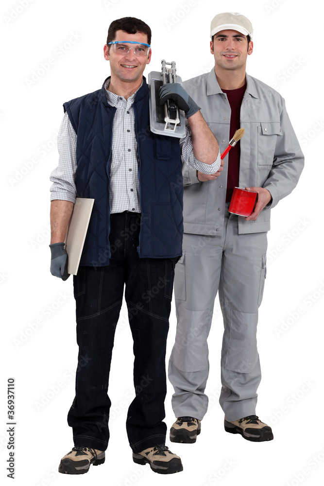 tiler and painter posing together tiler and painter posing together