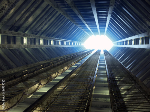 Sci-fi corridor leading to light