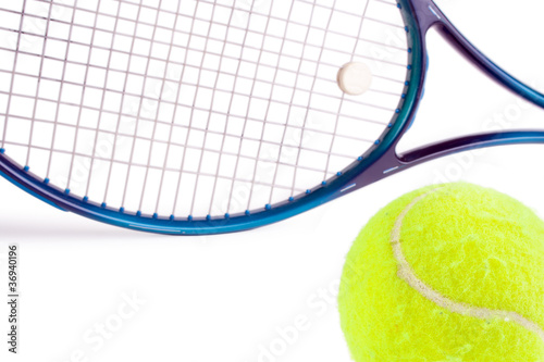 Tennis ball and racket, white background © arska n