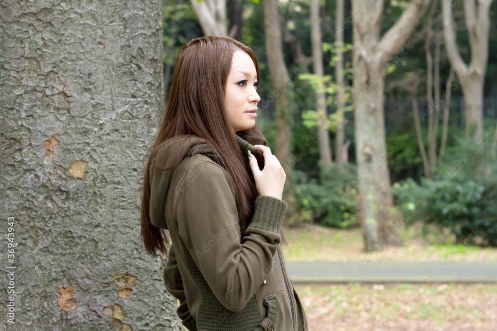 Beautiful young woman in the forest