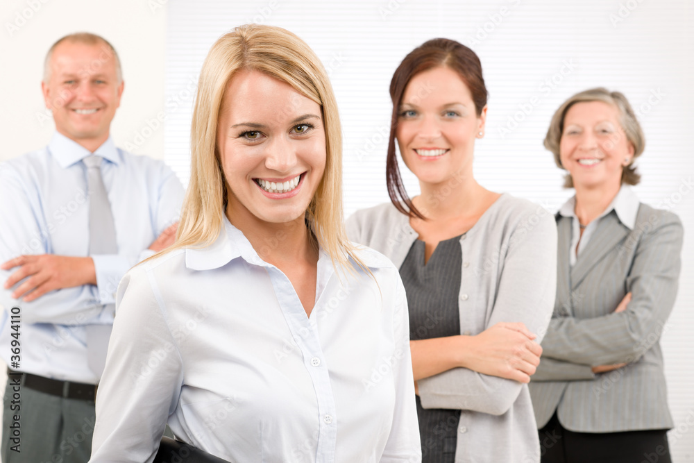 Business team young woman with mature colleagues Business team young woman with mature colleagues