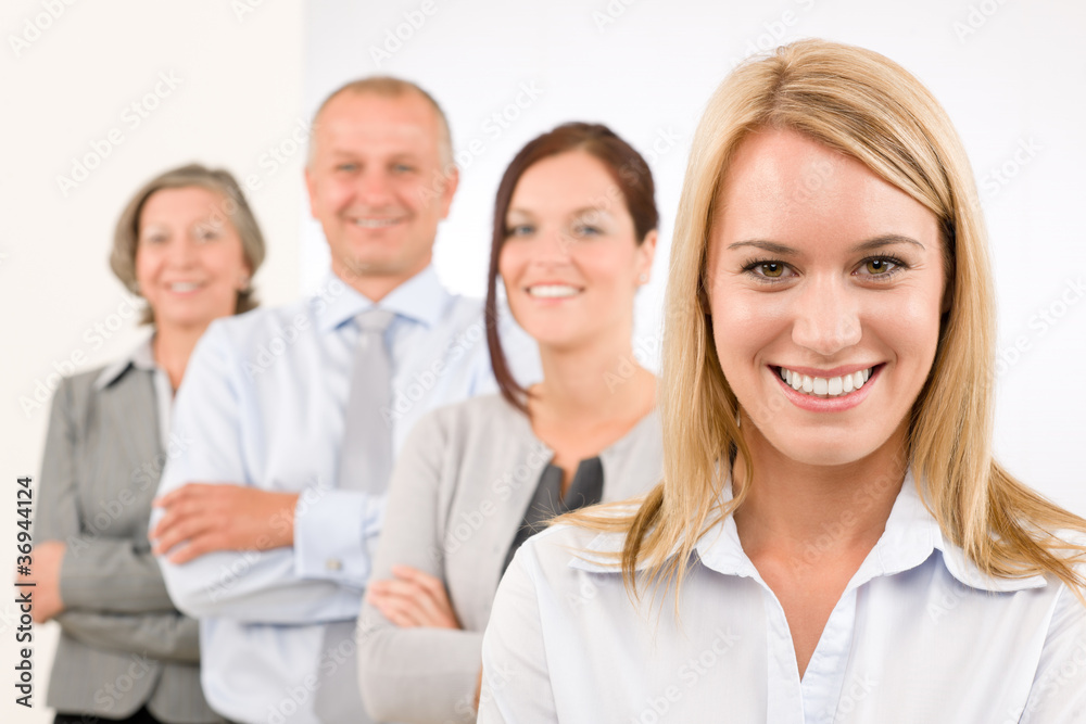 Business team happy standing in line portrait Business team happy standing in line portrait
