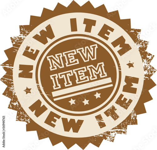 Stamp with the text new item written inside