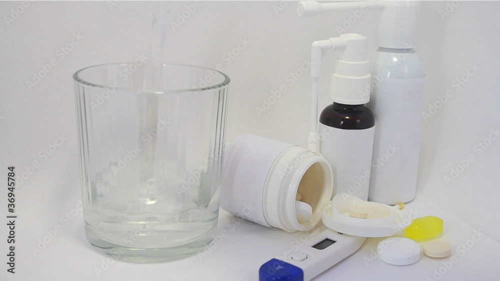 Pouring fresh water in glass and medicine. Pouring fresh water in glass and medicine.
