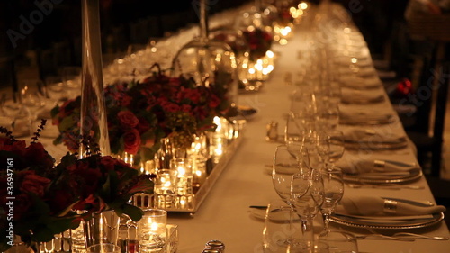 Elegant candlelight  dinner table setting at reception