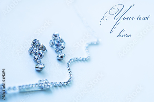 necklace and earrings on a white background