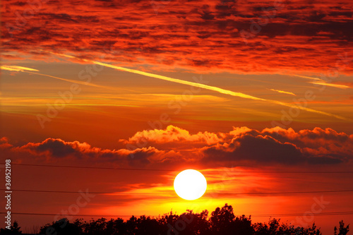 Sunset and bright orange cloudy sky