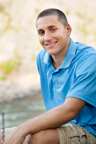 Young man portrait at the river