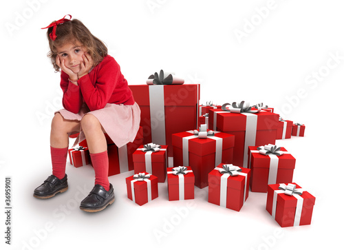 Photography Sad little girl with lots of presents