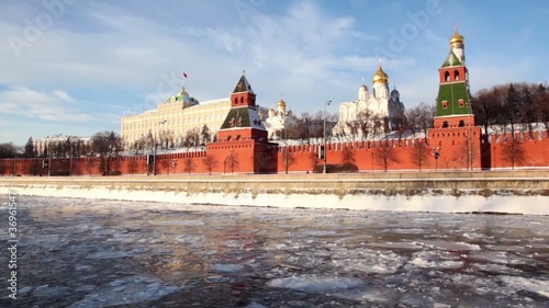 Red brick walls of Kremlin and Ivan Great Bell Tower at winter