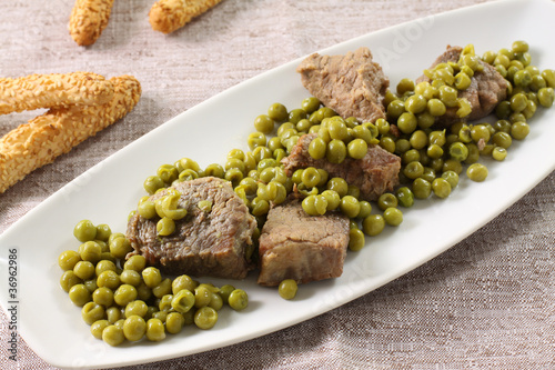 Spezzatino di carne con piselli - Meat stew with peas photo