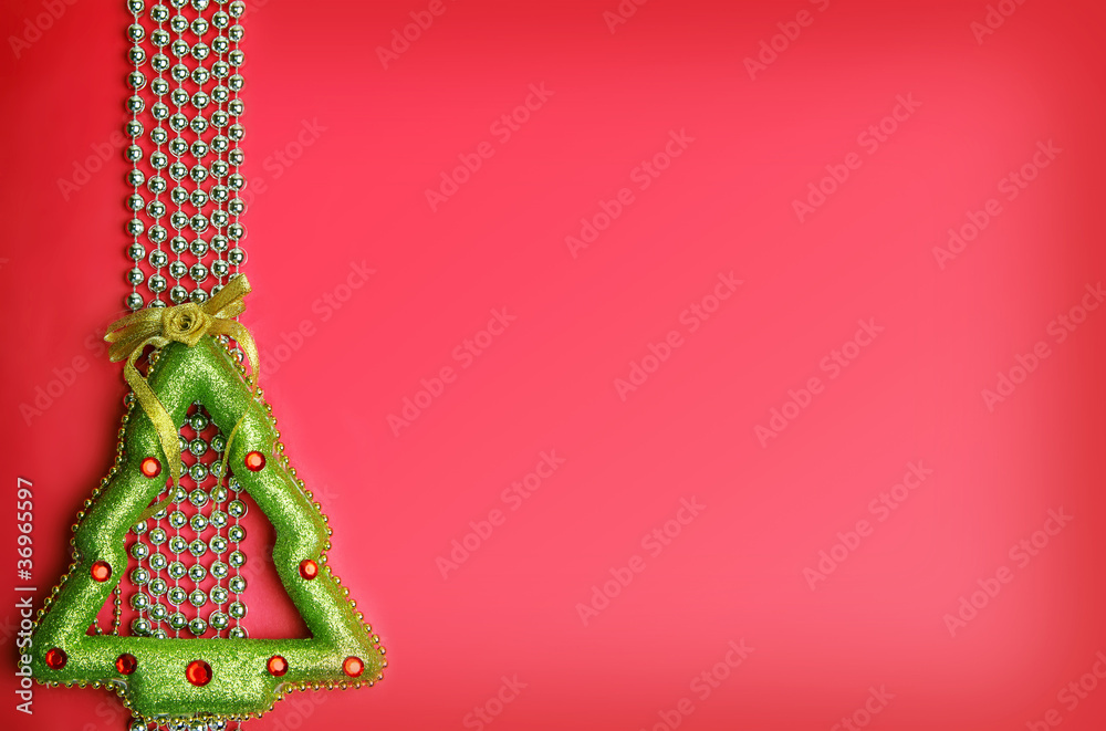 Christmas red background with a green tree