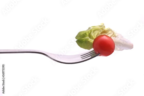 Fork, lettuce and tomato