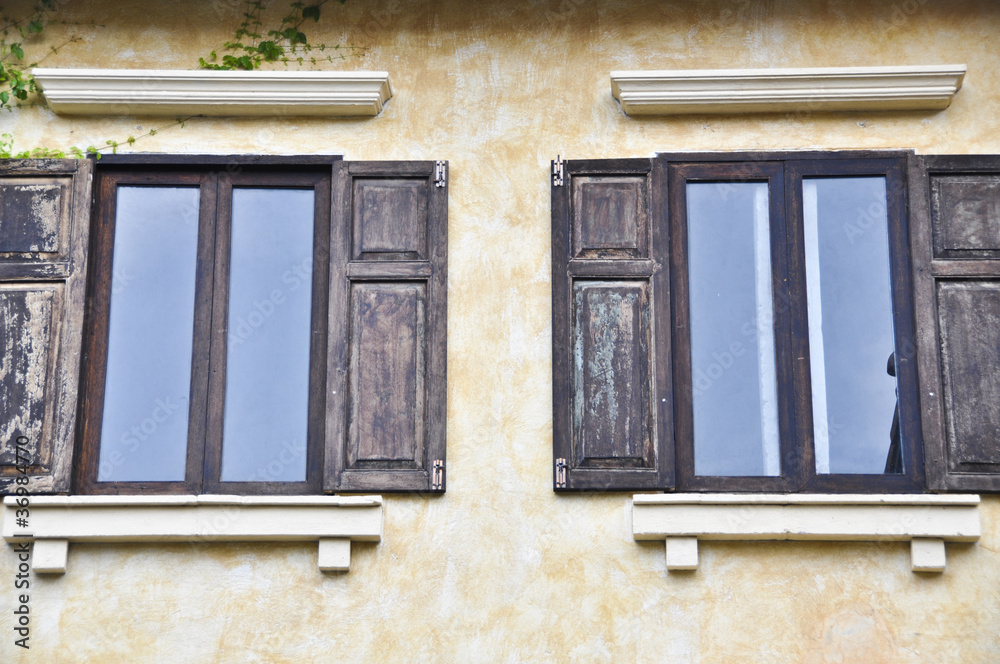 Italian style building with twin windows.