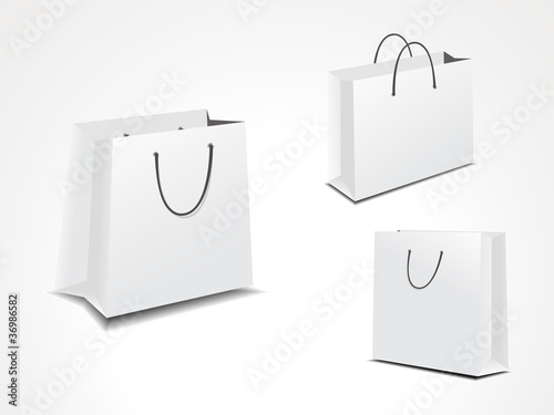 illustration set of three paper shopping bags.