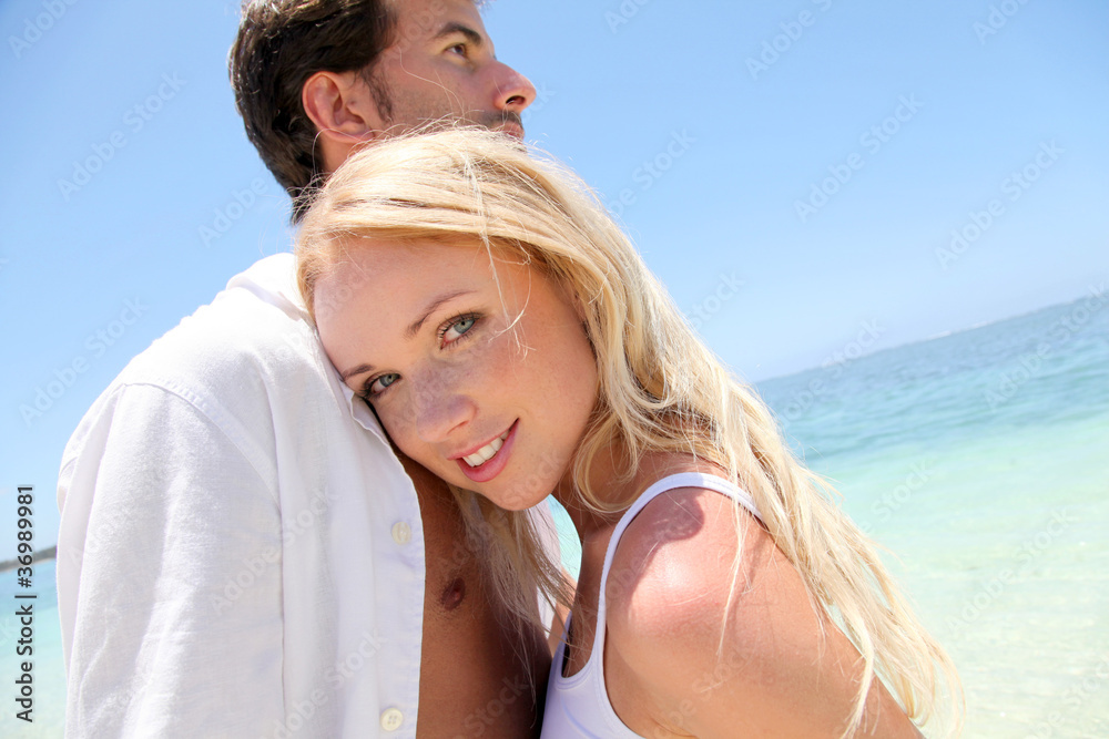Portrait of in loved couple on beach holidays Portrait of in loved couple on beach holidays