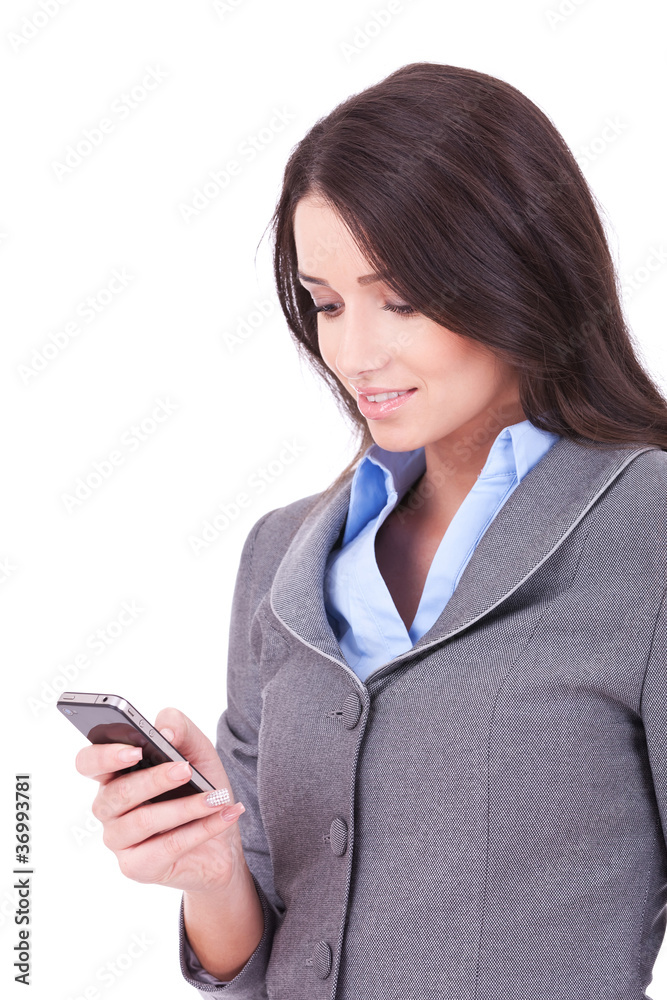 business woman texting from her cellphone business woman texting from her cellphone