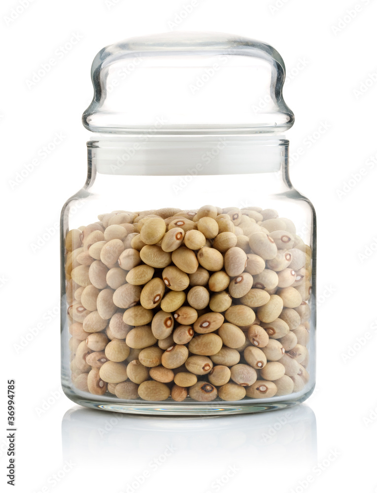 full glass jar with haricot seeds isolated on white background full glass jar with haricot seeds isolated on white background