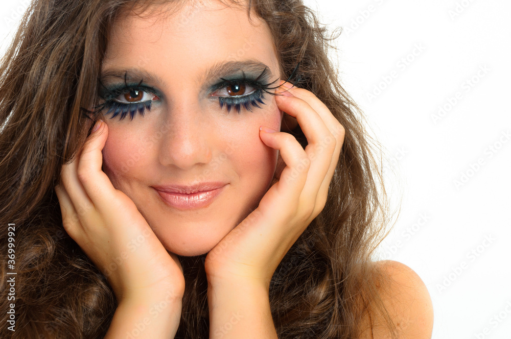Fototapeta premium young beautiful girl with extreme makeup on white isolated backg