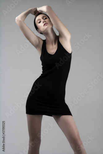 Young woman in little black dress © Studio-FI