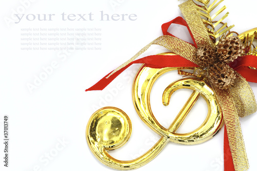 Christmas with musical signs and color ribbon.