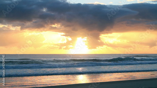 Beautiful sunrise at the beach photo