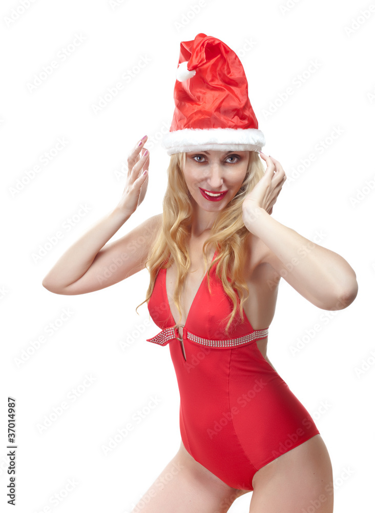The Snow Maiden.The blonde in a cap of Santa Claus The Snow Maiden.The blonde in a cap of Santa Claus