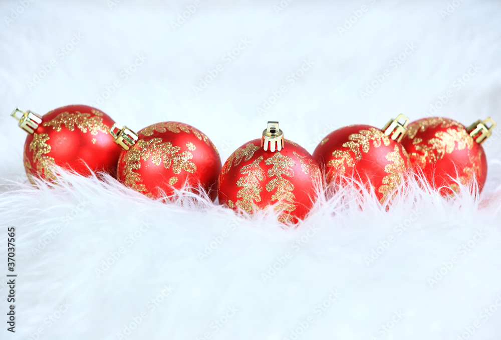 Red christmas balls with snow isolated on white Red christmas balls with snow isolated on white