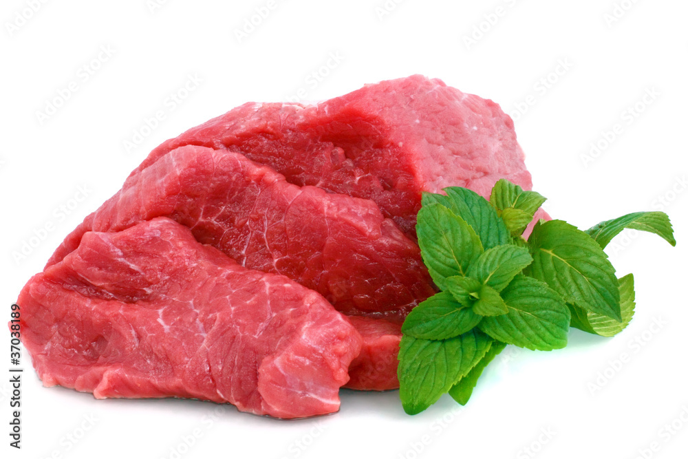 Cut of beef steak with green leaf. Isolated. Cut of beef steak with green leaf. Isolated.