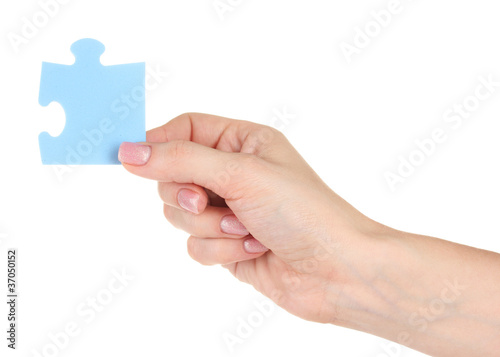 Blue puzzle with a hand isolated on white