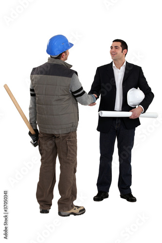 Plakat Architect shaking laborer's hand