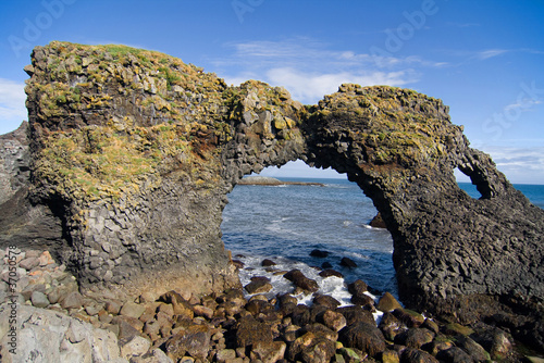 Volcanic rock arch in Iceland photo