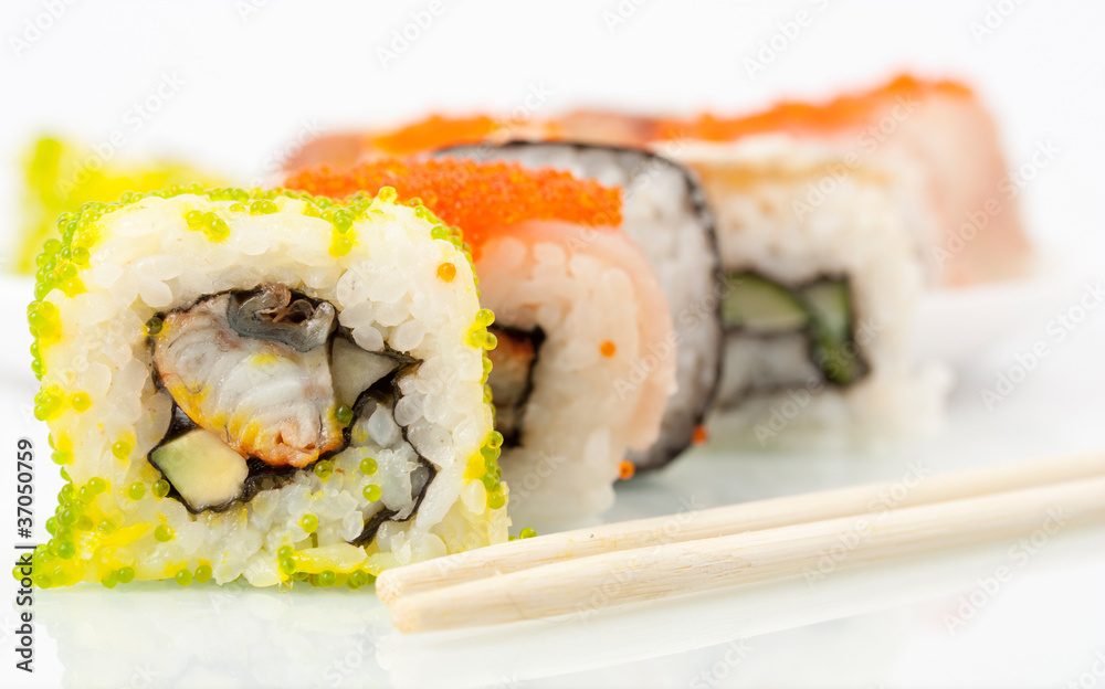 Close up photo of the sushi with caviar Close up photo of the sushi with caviar