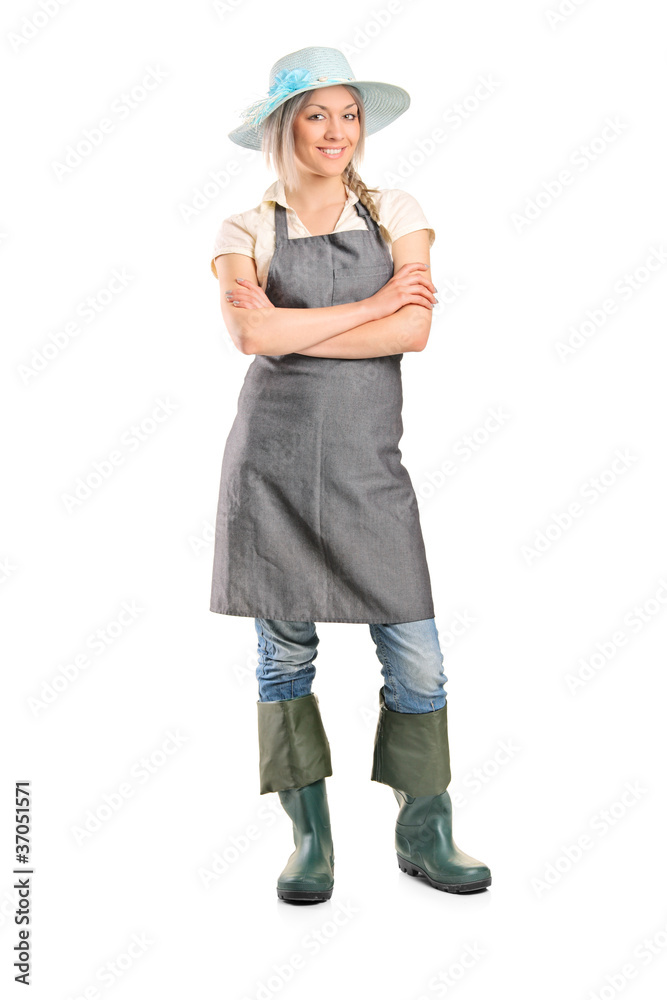 Portrait of a smiling female farmer with her hands crossed Portrait of a smiling female farmer with her hands crossed