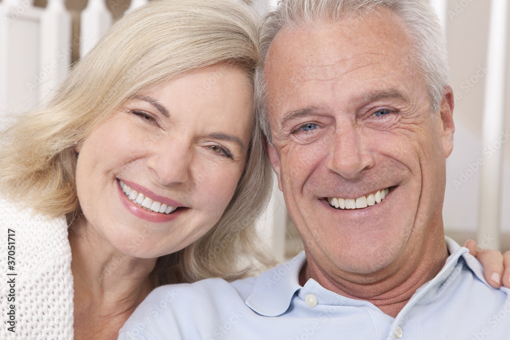 Happy Senior Man & Woman Couple Smiling at Home Happy Senior Man & Woman Couple Smiling at Home