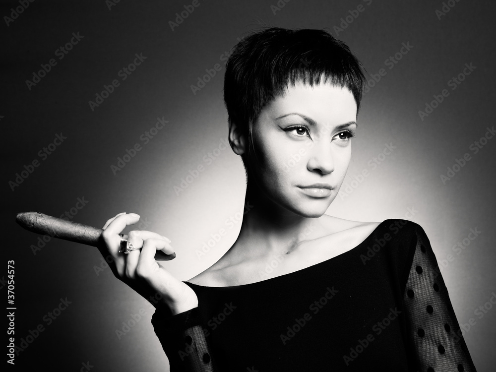 Fototapeta premium Stylish woman with cigar