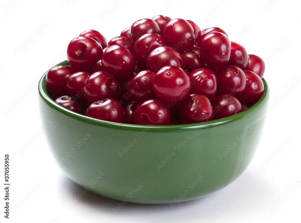 Bowl with ripe cherries. Isolated on a white background. Bowl with ripe cherries. Isolated on a white background.